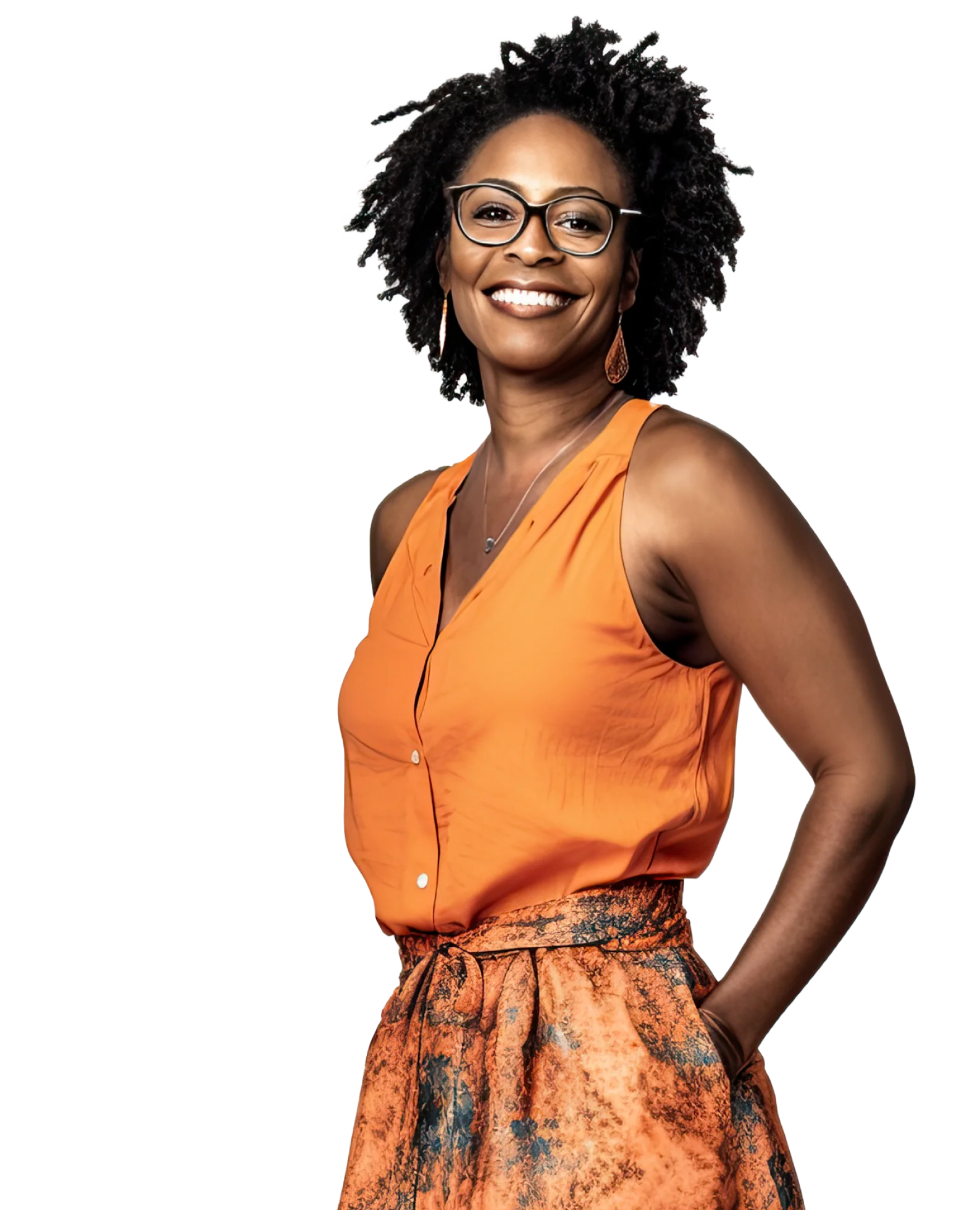 woman smiling at the camera in an orange top with glasses on