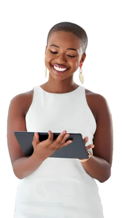 woman in white sleeveless dress smiling looking at her ipad
